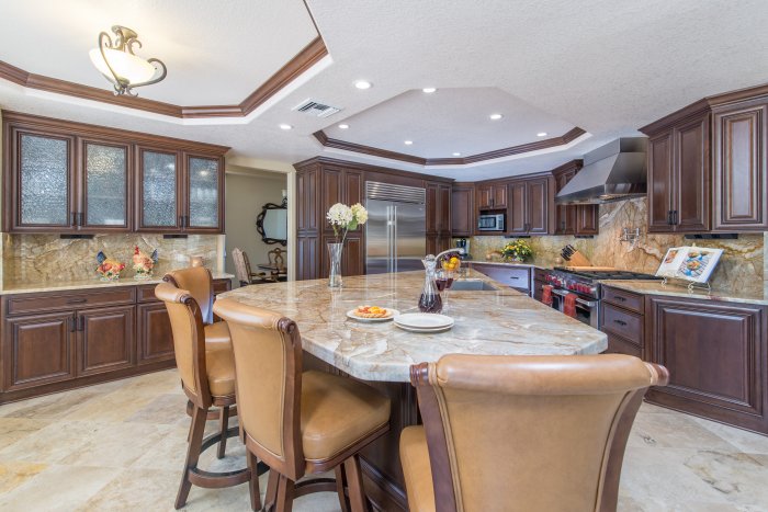kitchen island with armless bar stools brown tones